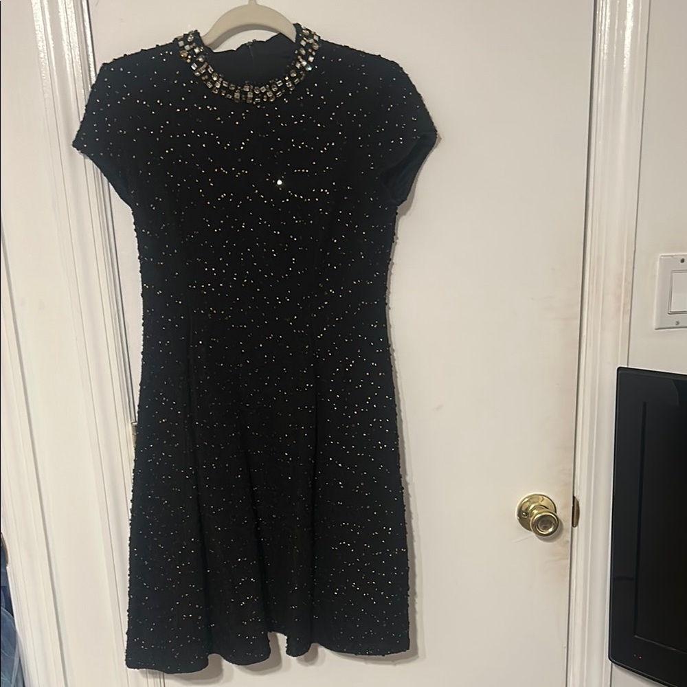 Black Dress with Gold Accents
